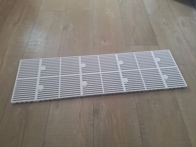 Modular Bottom Riser for Storage Compartment
