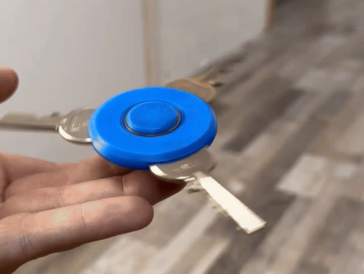 Key fidget spinner (click and play)