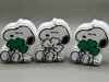 Black and white dog Holding a shamrock