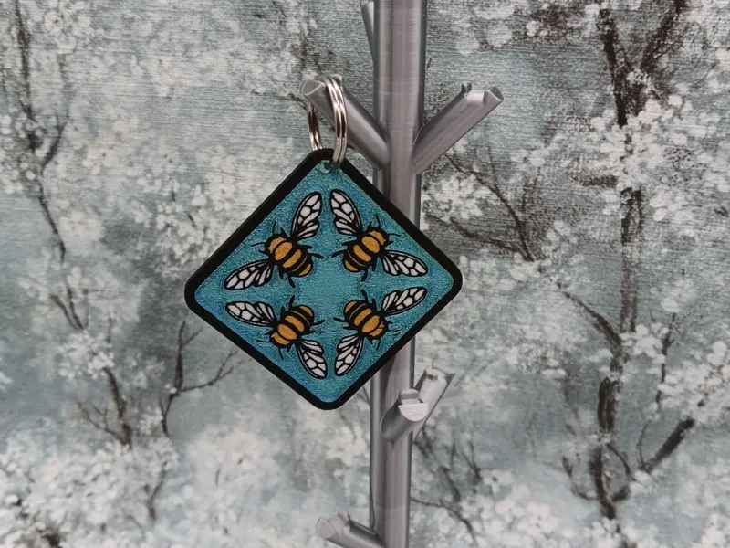 Four bee keychain