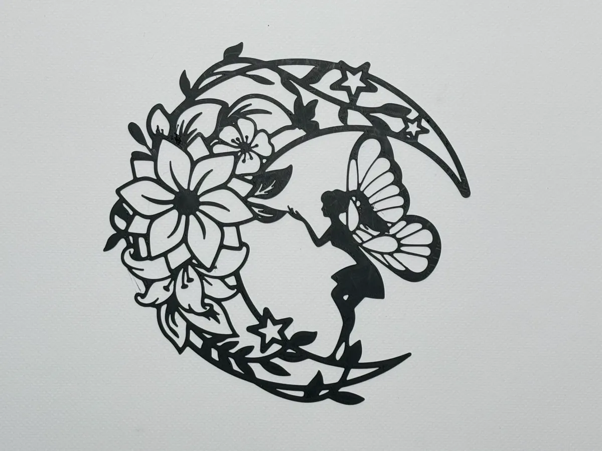 Décoration murale silhouette de fée sur la lune