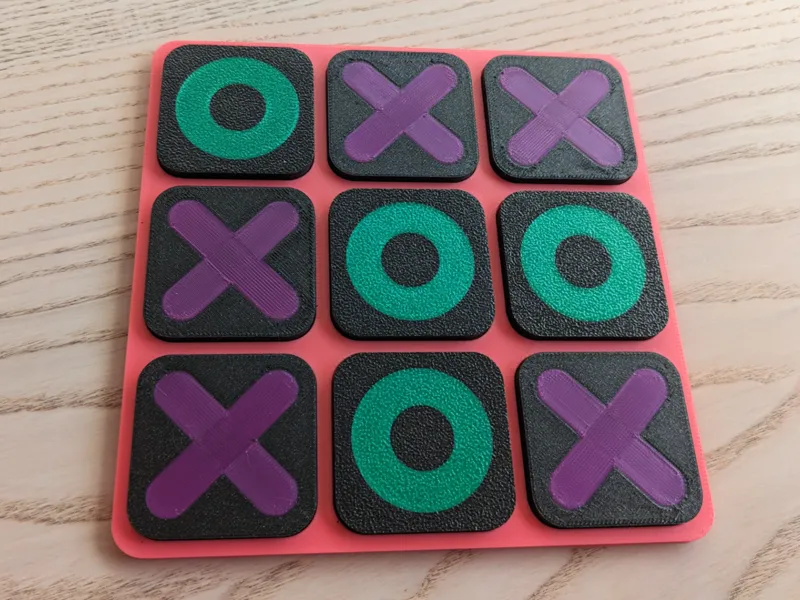 Tic-tac-toe (double sided piece)
