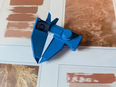 Folding rule caliper/measuring aid
