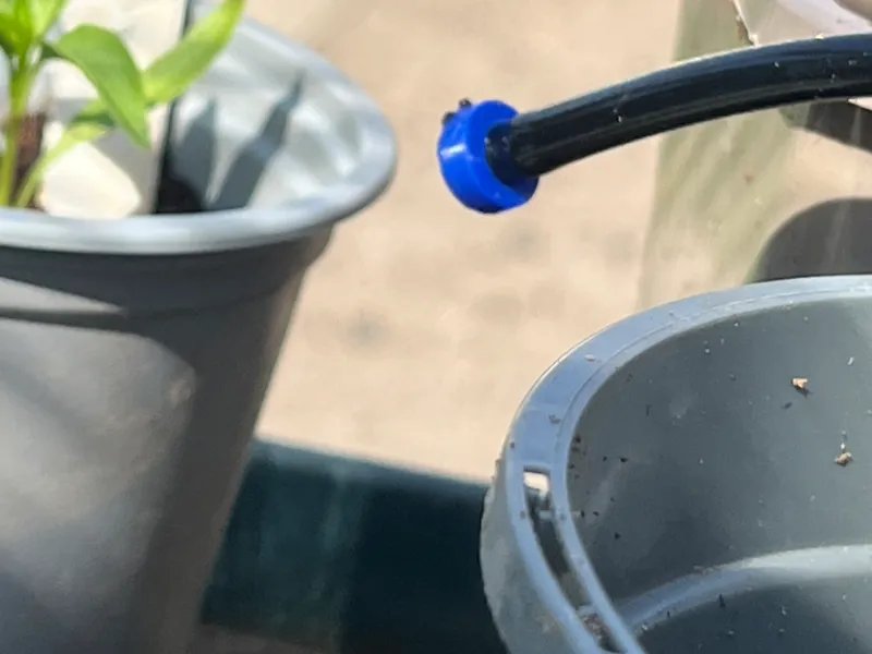 Irrigation hose stopper
