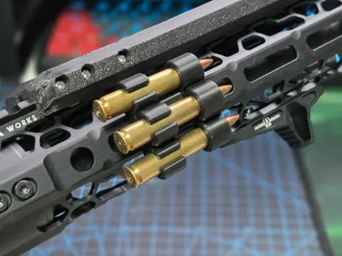 Soporte: 5.56mm NATO M-LOK HOLDER — referencia de MakerWorld