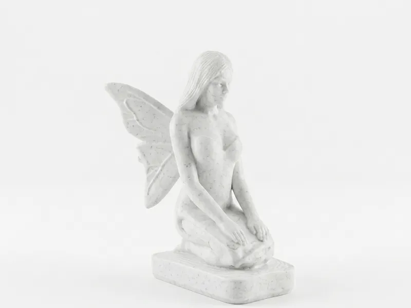 kneeling fairy statue