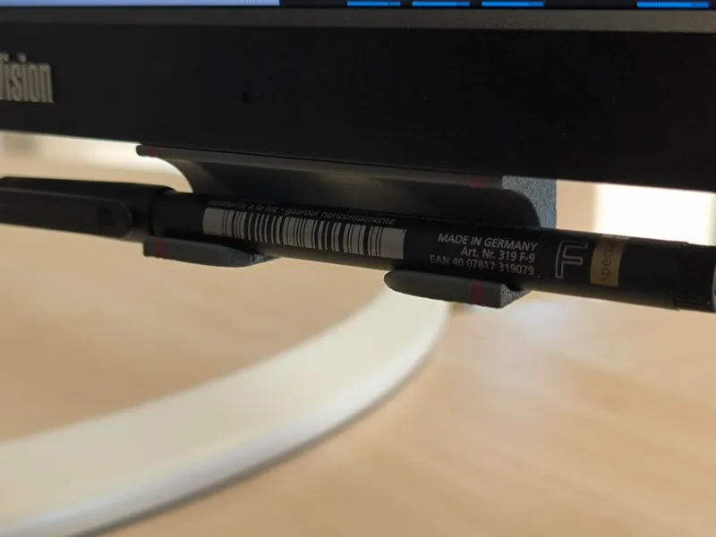 under monitor pen holder