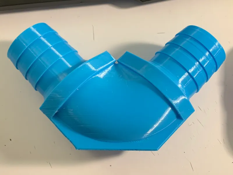 Vynil hose connector, right angle, 1.5 inch