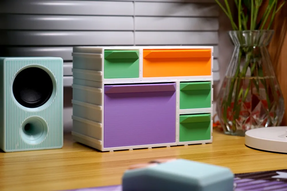 Modular storage boxes, expandable with accessories such as pen holders ...