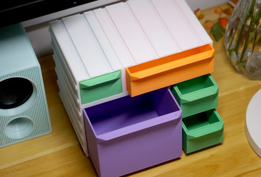 Modular storage boxes, expandable with accessories such as pen holders ...