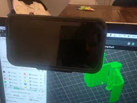 Print in place phone holder for airplane trays.