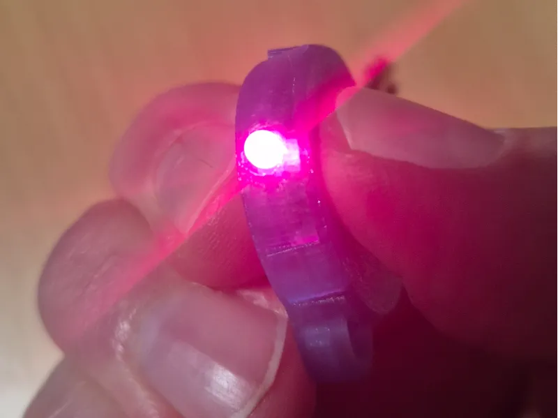 Key cover with pushable LED light