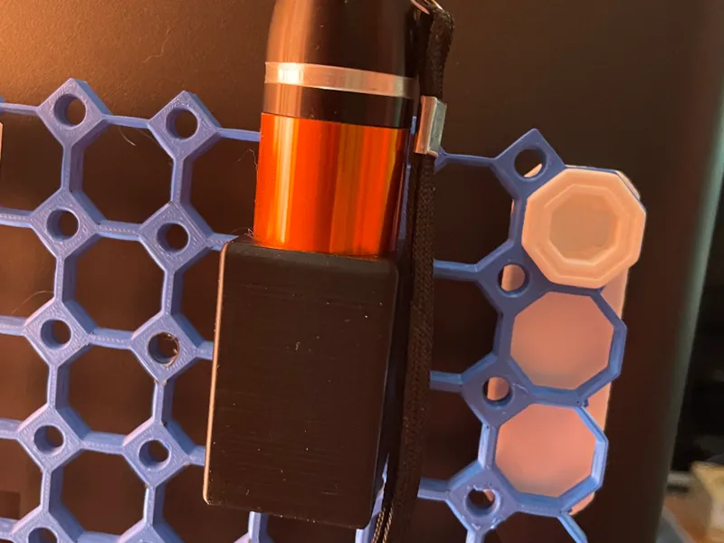 Multiboard Flashlight Holder