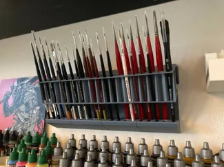 Paint brush wall holder