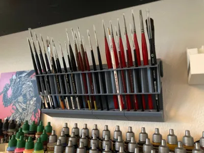 Paint brush wall holder