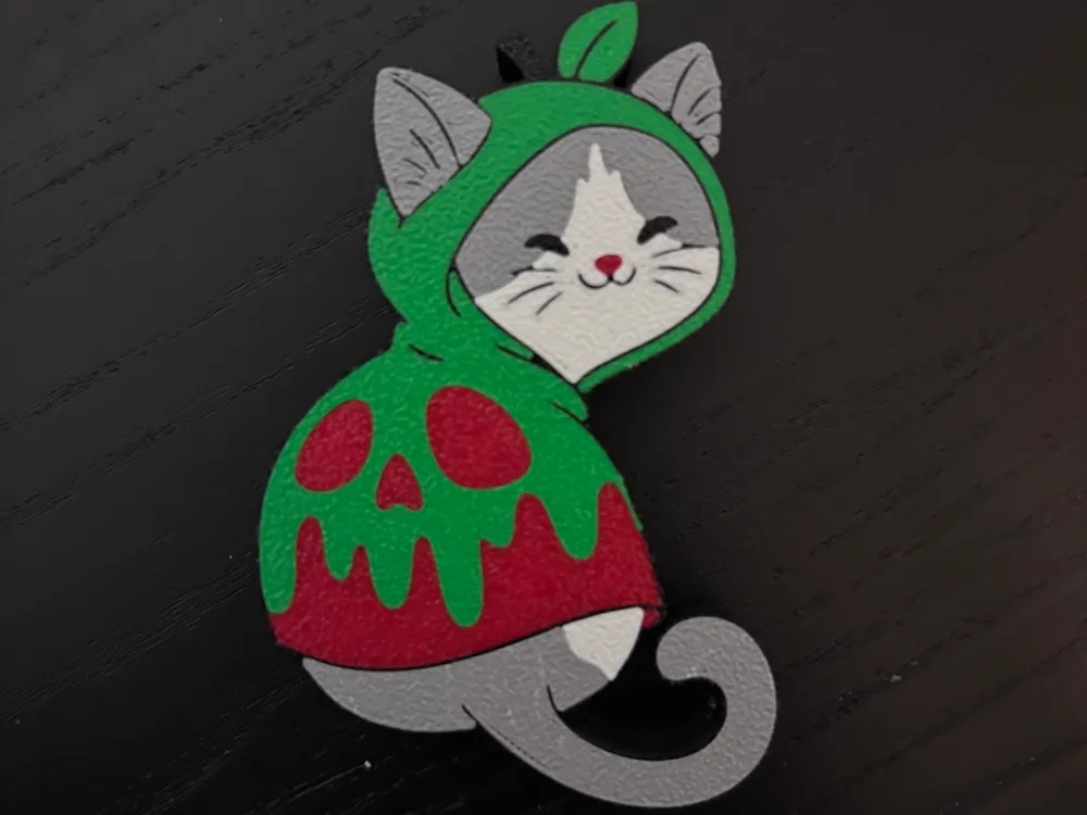 Soporte: Evil Queen Cat - belt bag charm. Referencia del modelo original.