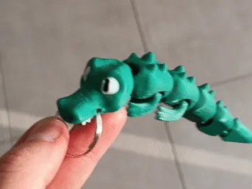 Flexi Crocodile Keychain - Articulated Alligator by Valeria Momo & Mattia MakerWorld: Download Free 3D Models - 3D model önizlemesi