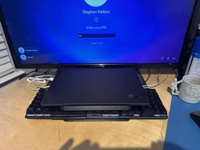 Laptop stand with underneath keyboard storage