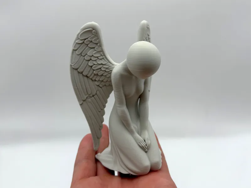 Noface Angel Figurine