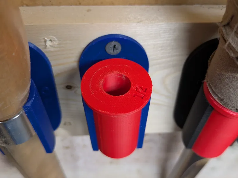 Wall mounted tool holder and different size insert