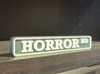 Horror Rd sign