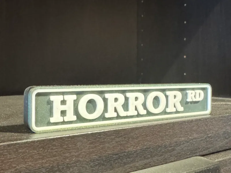 Horror Rd sign