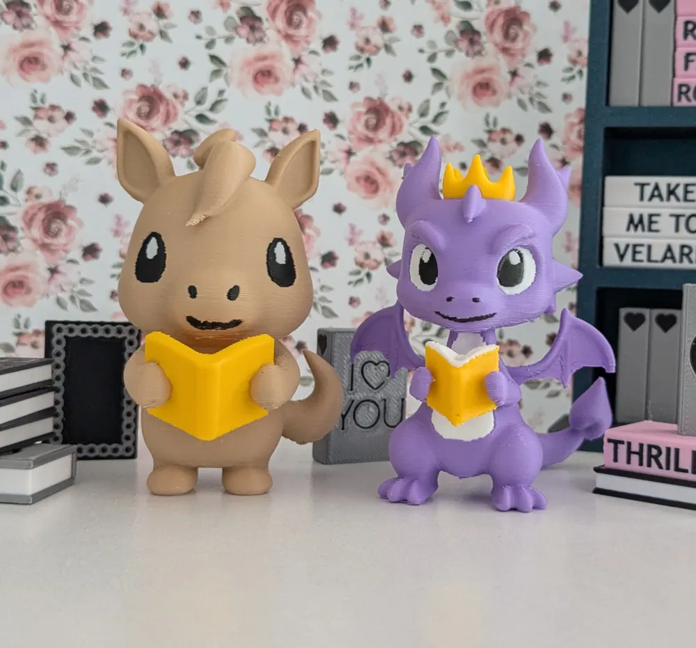 Printmon Dragon Holding Book Printmon by GoatMa$ter - MakerWorld