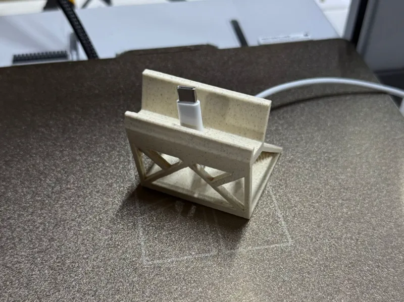 Soporte cargador teléfono móvil
