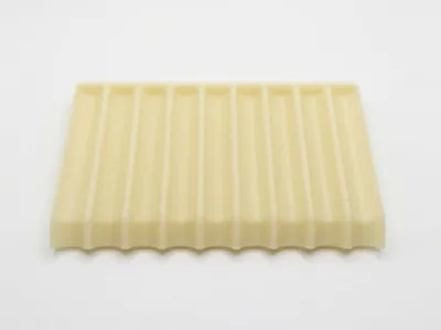 Simple soap dish where water drains into the sink