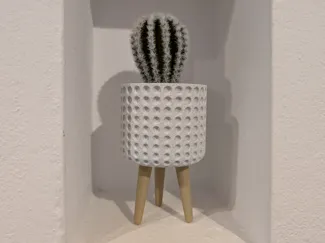 Textured small planter with legs