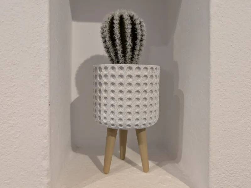 Textured small planter with legs