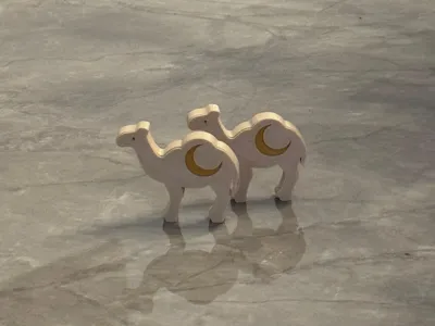 Elegant decorative camel with and without crescent moon 