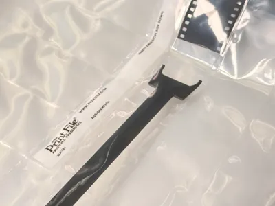 Loader/Puller for 35mm Film Strip Archive Sleeve