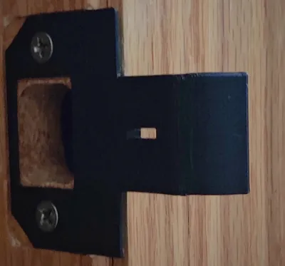 Strike plate with lock for house door