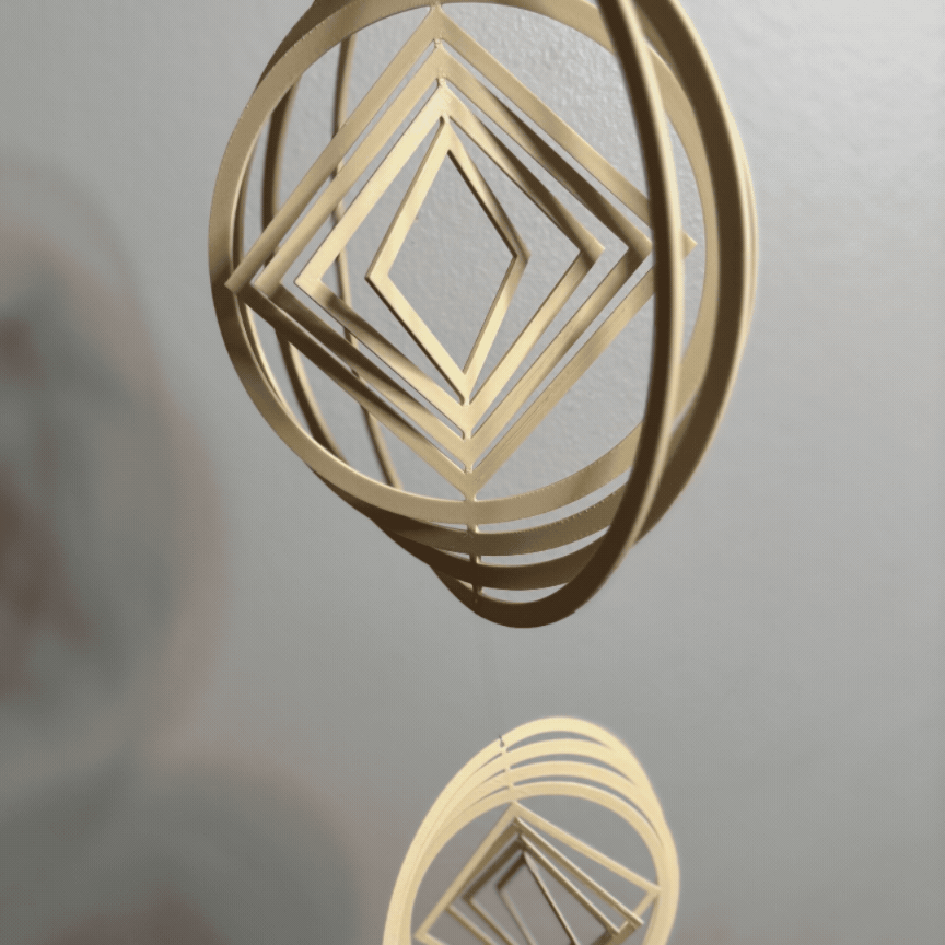Dual Spinning Optical Illusion Wind Spinner