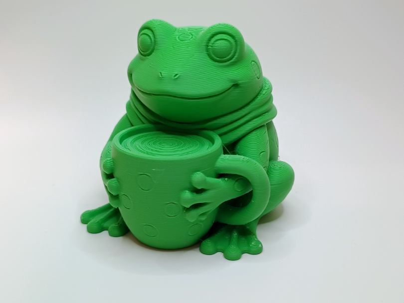 Frosch mit Tasse als charmantes Deko Motiv