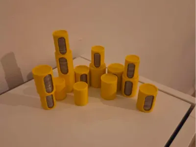 Coin storage containers for Danish 1, 2, and 5 kr.