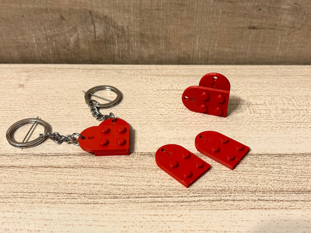 Heart-shaped keychain with couple's initials
