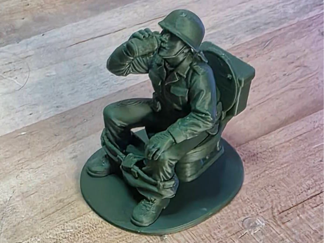 Green toy Army Soldier on Toilet Poop Drink Beer