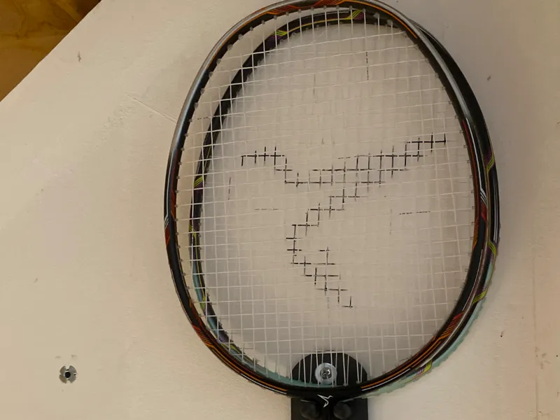 support mural pour raquette de badminton