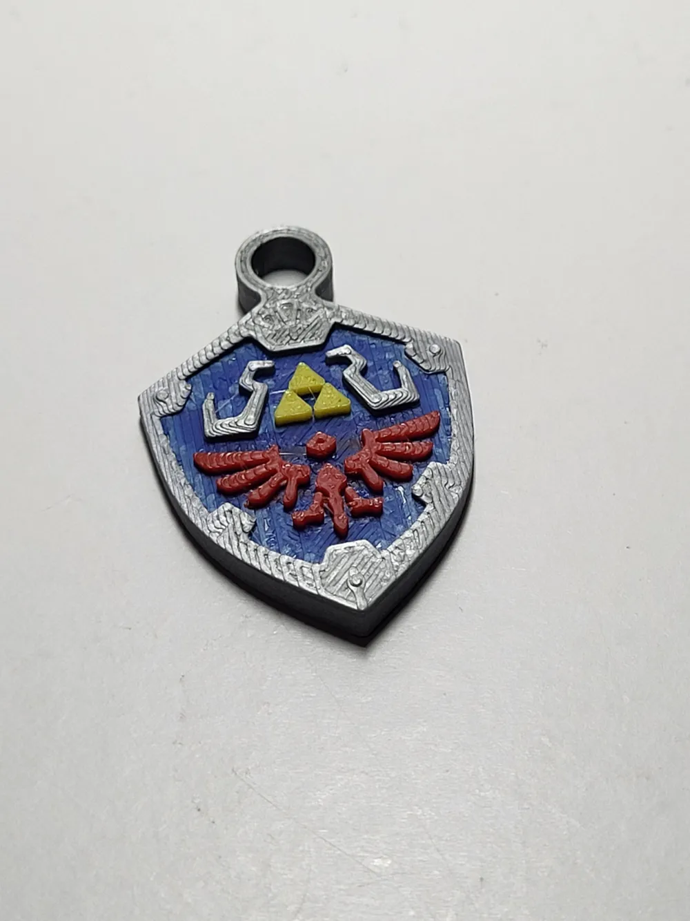 Mini Shield Keychain Hylian Shield Keychain - Legend of Zelda - Free 3D Print Model - MakerWorld