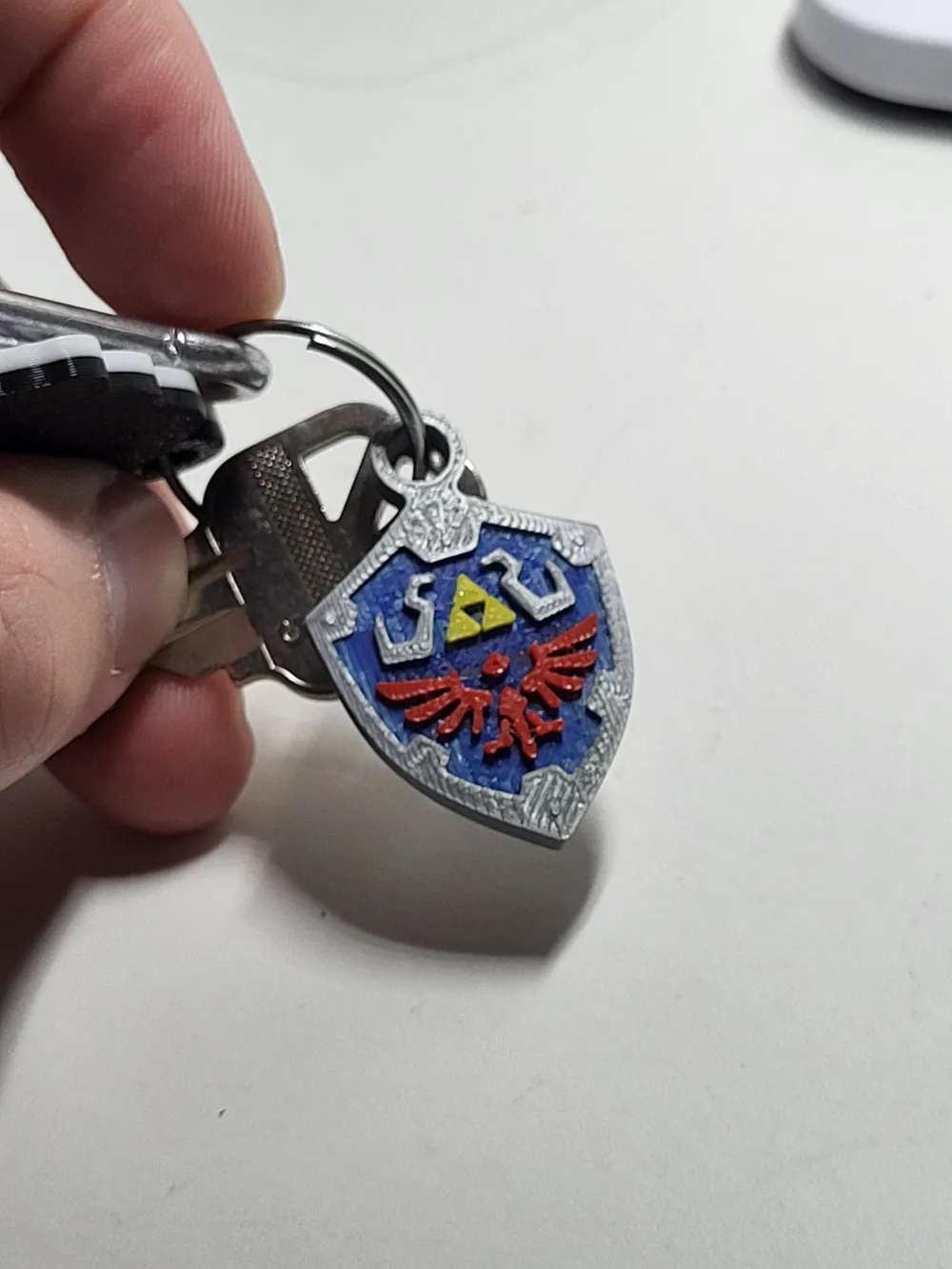 Mini Shield Keychain Hylian Shield Keychain - Legend of Zelda - Free 3D Print Model - MakerWorld