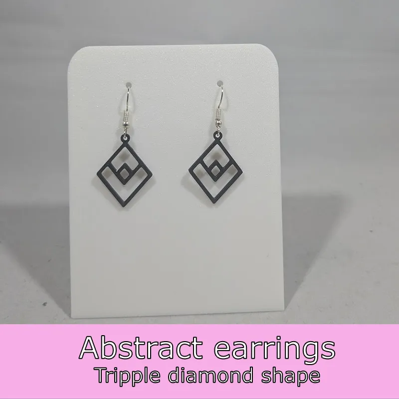 Abstract earrings - tripple diamond view 2