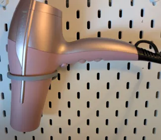 Skådis hair dryer holder
