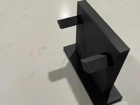 Upright stand with prongs.