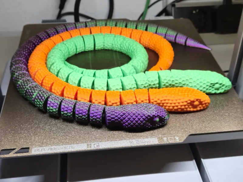 three articulated textured snakes