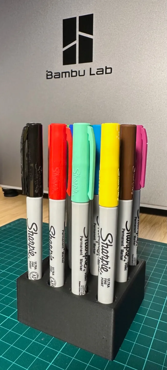 Simple Sharpie holder for fine-point sharpies.