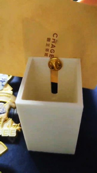 Metal badge back buckle removal tool