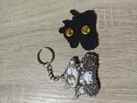 SV-001 keychain/ pin badge