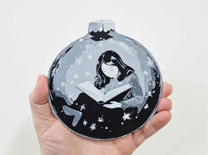 Girl reading book christmas bauble